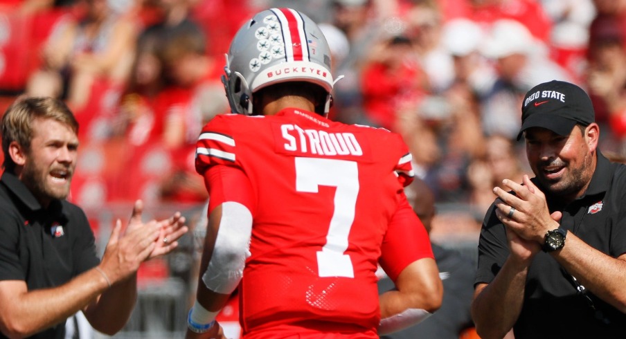 Ohio State Buckeyes head coach Ryan Day applauds quarterback C.J. Stroud (7) during warm-ups prior to the NCAA football game against the Tulsa Golden Hurricane at Ohio Stadium in Columbus on Saturday, Sept. 18, 2021 