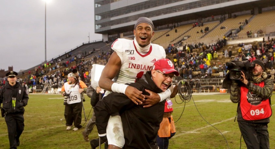 Indiana head coach Tom Allen carries Indiana wide receiver Whop Philyor (1) across the field after defeating Purdue, 44-41 in double overtime to win the Old Oaken Bucket, Saturday, Nov. 30, 2019 at Ross-Ade Stadium in West Lafayette.