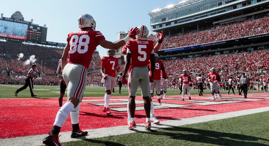 Garrett Wilson (5) celebrates after scoring a touchdown during the first quarter of a NCAA Division I football game between the Ohio State Buckeyes and the Maryland Terrapins on Saturday, Oct. 9,