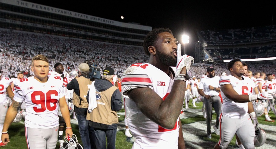 Sep 29, 2018; University Park, PA, USA; Ohio State Buckeyes wide receiver Parris Campbell (21) gestures while walking off the field following the competition of the game against the Penn State Nittany Lions at Beaver Stadium. Ohio State defeated Penn State 27-26.