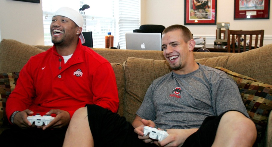 Marcus Freeman and James Laurinaitis play video games at Laurinaitis' apartment, Wednesday, April 15, 2009. 