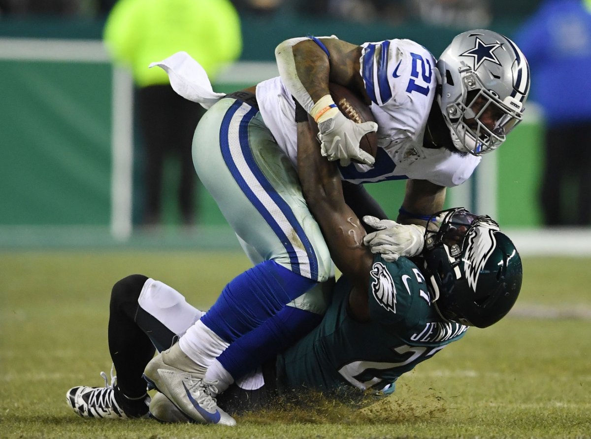 Dec 22, 2019; Philadelphia, Pennsylvania, USA; Dallas Cowboys running back Ezekiel Elliott (21) is tackled by Philadelphia Eagles strong safety Malcolm Jenkins (27) during the fourth quarter at Lincoln Financial Field. Mandatory Credit: James Lang-USA TODAY Sports