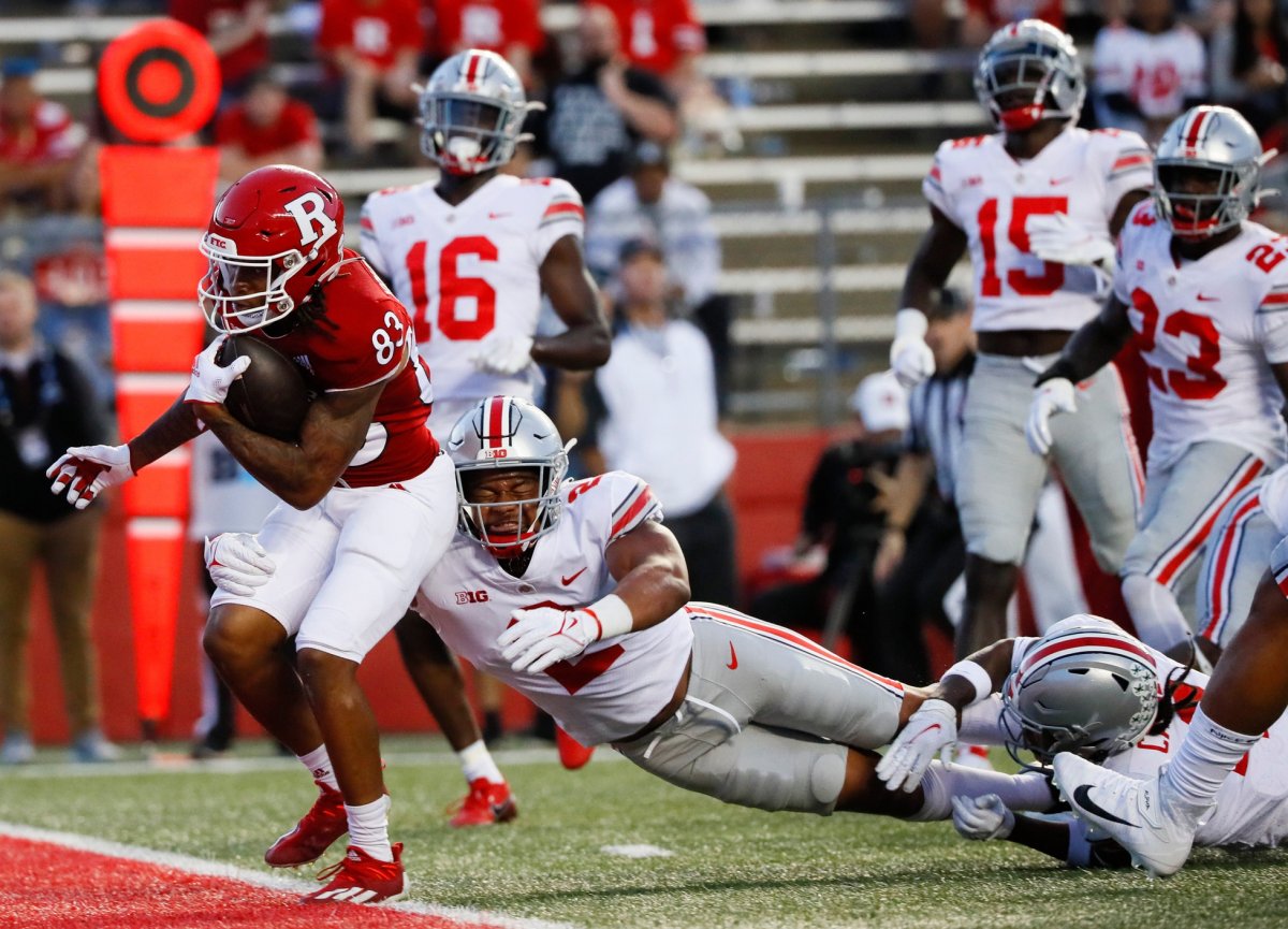 Ohio State Buckeyes safety Kourt Williams II (2) can't tackle Rutgers Scarlet Knights wide receiver Joshua Youngblood (83) as he drives into the end zone for a touchdown 