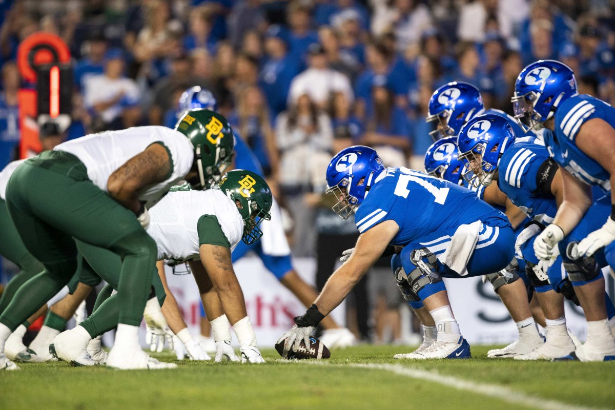 BYU Cougars football team at the line of scrimmage opposite the Baylor Bears