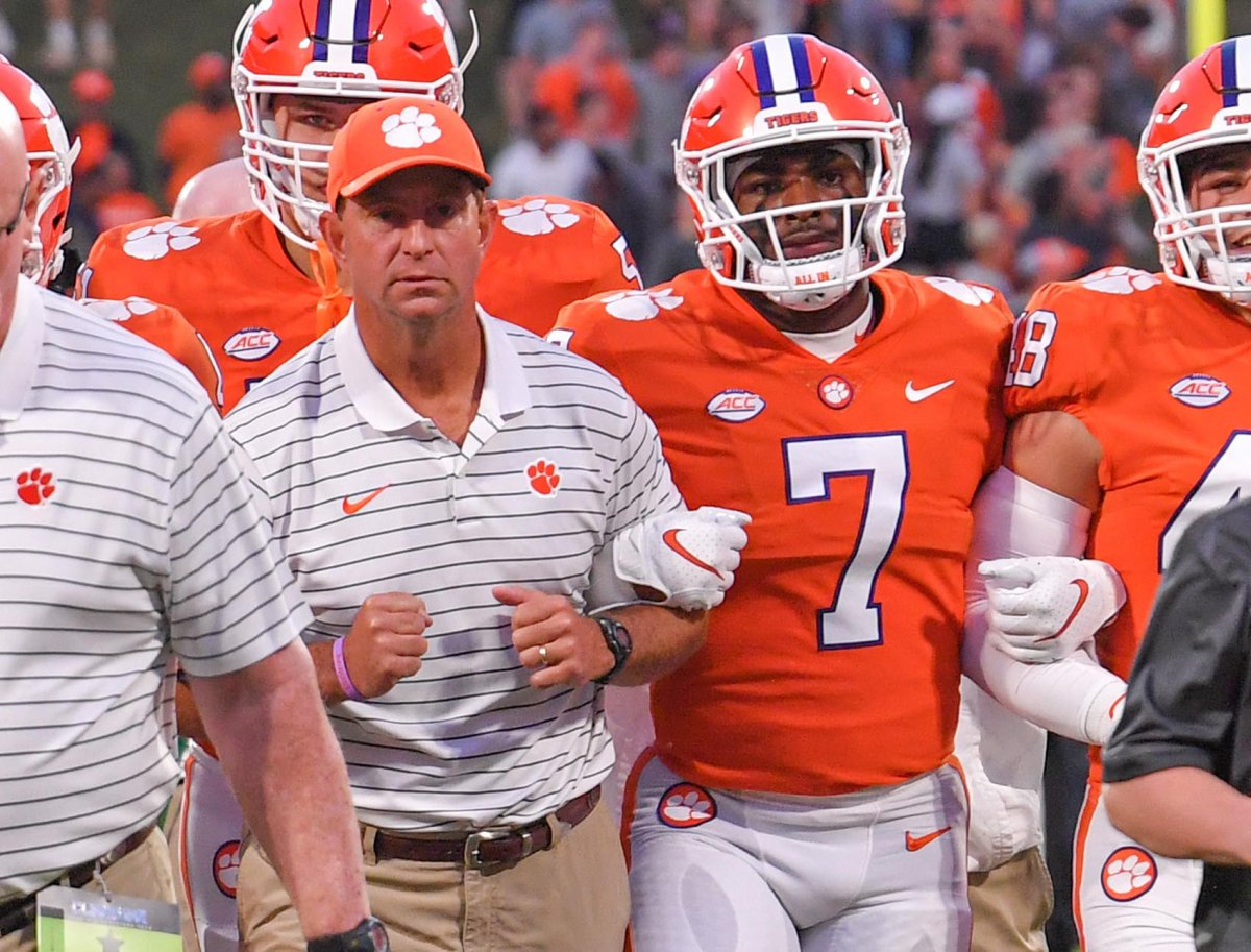 Clemson running back Kobe Pace with head coach Dabo Swinney