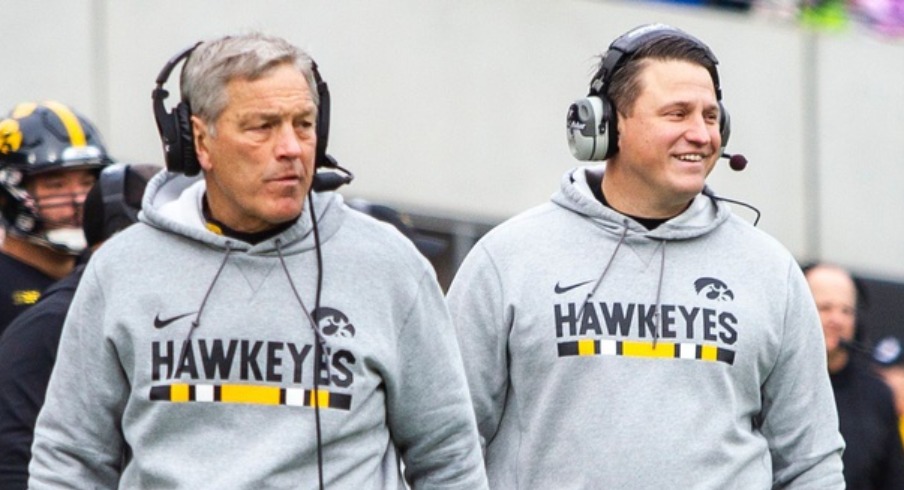 owa head coach Kirk Ferentz and Iowa offensive coordinator Brian Ferentz walk on the sideline during a Big Ten Conference NCAA football game on Friday, Nov. 23, 2018, at Kinnick Stadium in Iowa City. 