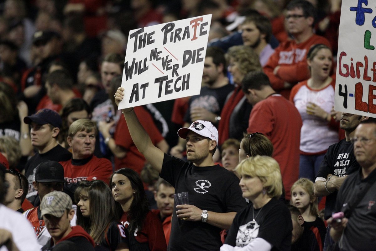 Jan 2, 2010; San Antonio, TX, USA; Texas Tech Red Raiders fan holds a sign in support of former head coach Mike Leach against the Michigan State Spartans in the first quarter of the 2010 Alamo Bowl at the Alamodome. Mandatory Credit: Brett Davis-USA TODAY Sports