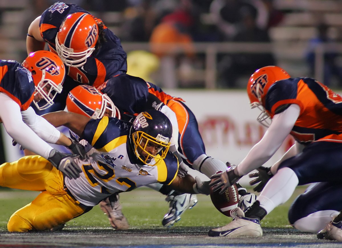 Dec 21, 2005; Mobile, AL, USA; Toledo Rockets running back Quinton Broussard (23) reaches for the ball he fumbled at the Texas-EL Paso Miners line during the first half of the GMAC Bowl at Ladd-Peebles Stadium in Mobile, AL.