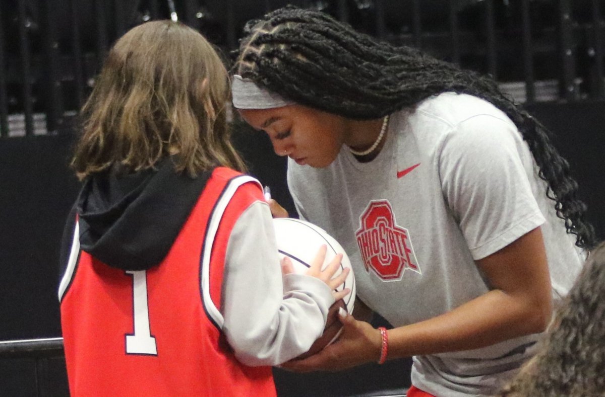 Cotie McMahon signing an autograph