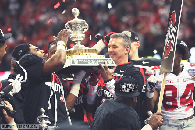 zeke and urb raise the 2015 sugar bowl trohy