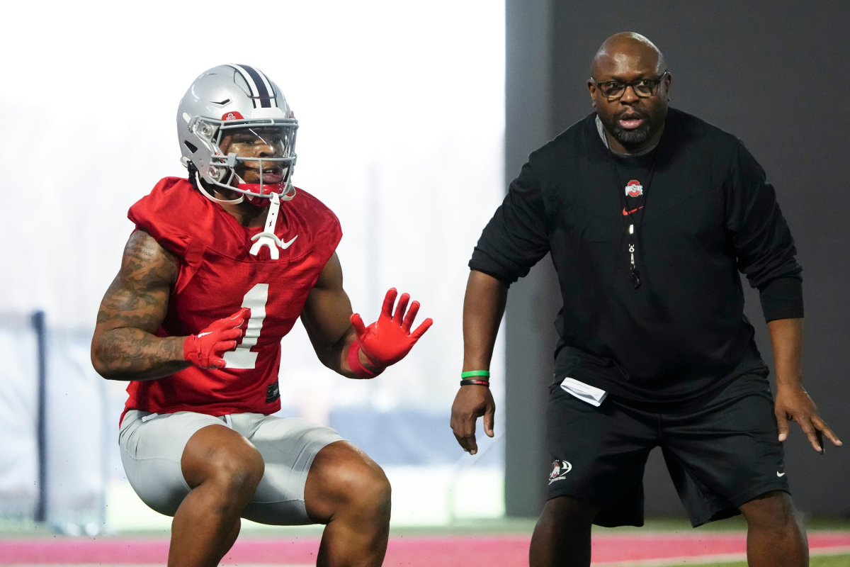 Mar 7, 2024; Columbus, OH, USA; Ohio State Buckeyes running back Quinshon Judkins (1) works with running backs coach Tony Alford during spring football practice at the Woody Hayes Athletic Center.
