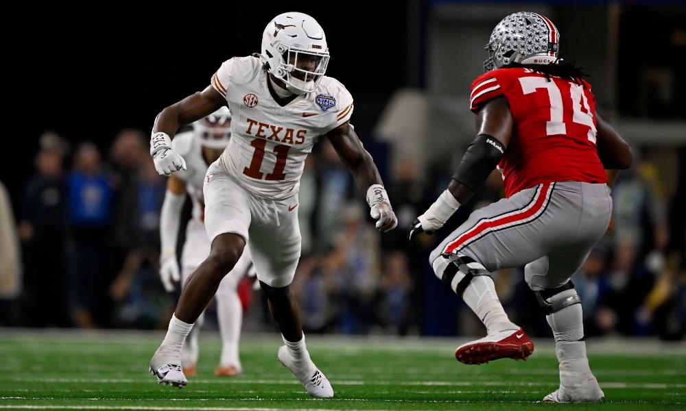 Jan 10, 2025; Arlington, TX, USA; Texas Longhorns linebacker Colin Simmons (11) and Ohio State Buckeyes offensive lineman Donovan Jackson (74) in action during the game between the Texas Longhorns and the Ohio State Buckeyes at AT&T Stadium. Mandatory Credit: Jerome Miron-Imagn Images Jan 10, 2025; Arlington, TX, USA; Texas Longhorns linebacker Colin Simmons (11) and Ohio State Buckeyes offensive lineman Donovan Jackson (74) in action during the game between the Texas Longhorns and the Ohio State Buckeyes at AT&T Stadium. Mandatory Credit: Jerome Miron-Imagn Images