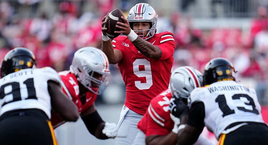 Tavien St. Clair (9) takes a snap during the second half of the NCAA football game against the Grambling State Tigers at Ohio Stadium on Sept. 6, 2025. Ohio State won 70-0.
