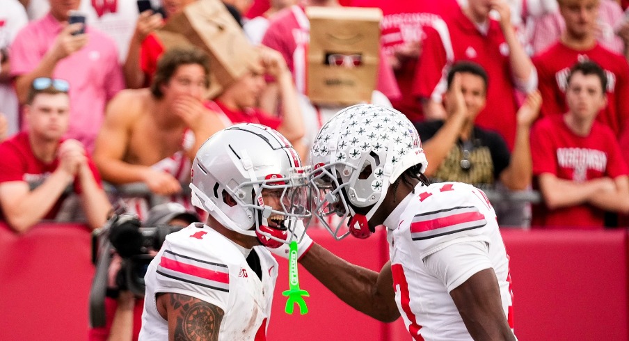 Ohio State Buckeyes wide receiver Brandon Inniss (1) celebrates after scoring a touchdown with Carnell Tate (17) in the second half at Camp Randall Stadium on Saturday, Oct. 18, 2025 in Madison, Wisconsin
