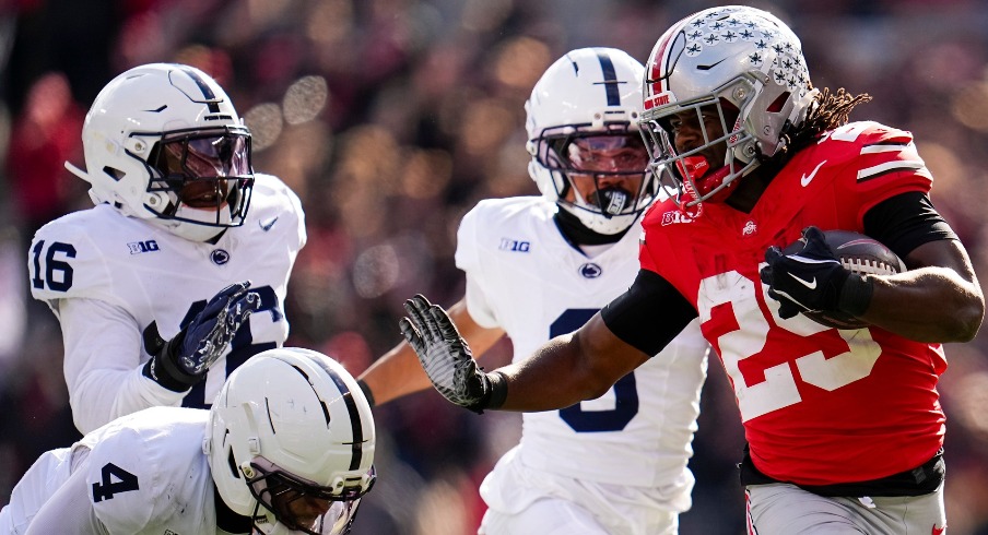 Ohio State Buckeyes running back Bo Jackson (25) runs past Penn State Nittany Lions cornerback AJ Harris (4) during the NCAA football game at Ohio Stadium in Columbus on Nov. 1, 2025. Ohio State Buckeyes running back Bo Jackson (25) runs past Penn State Nittany Lions cornerback AJ Harris (4) during the NCAA football game at Ohio Stadium in Columbus on Nov. 1, 2025.