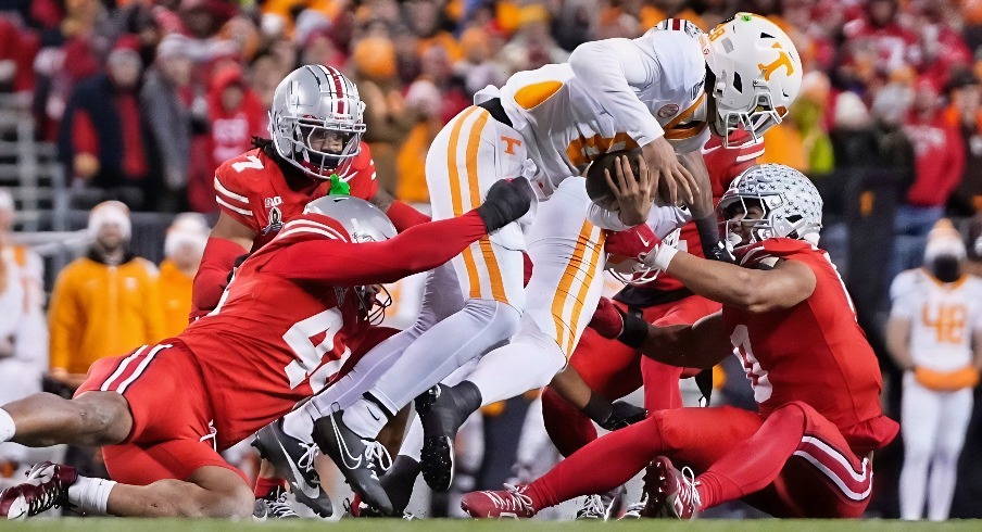 JT Tuimoloau (44) sacks Tennessee Volunteers quarterback Nico Iamaleava (8) during the first half of the College Football Playoff first round game at Ohio Stadium in Columbus on Dec. 21, 2024.