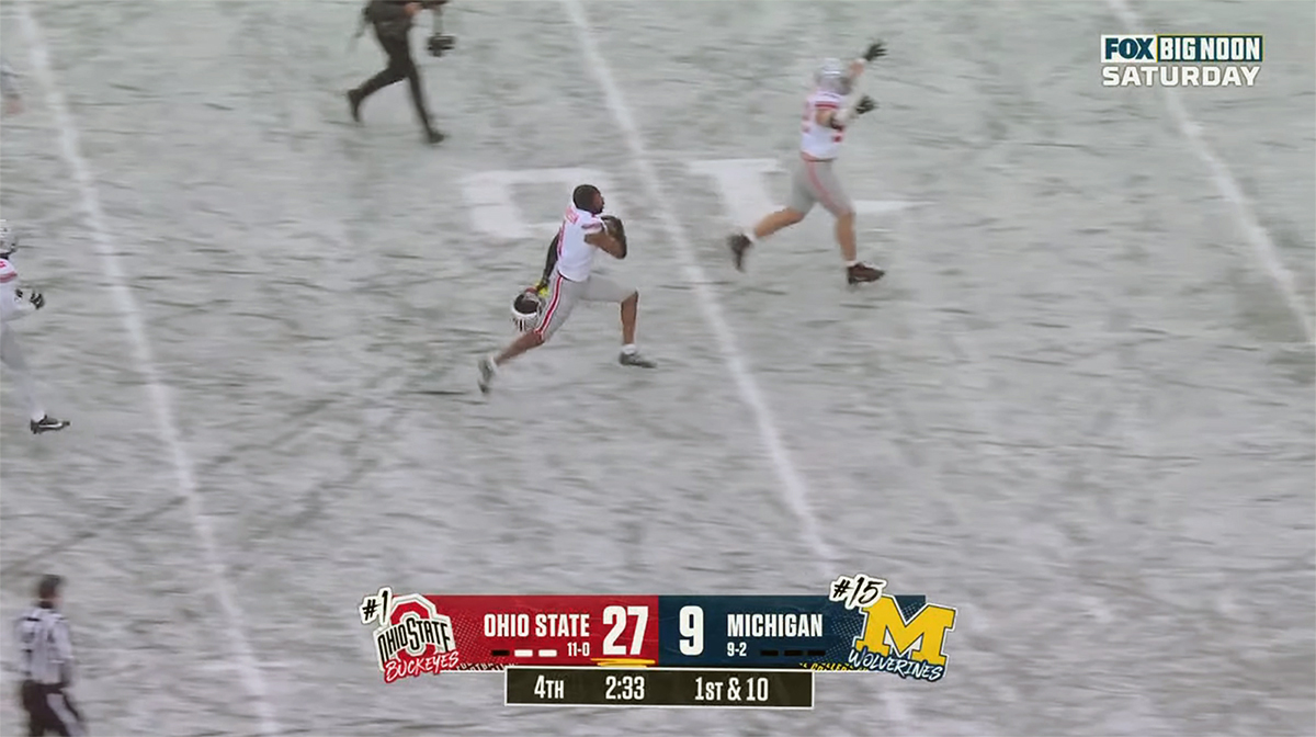 Davison Igbinosun goes helmet off following his late interception