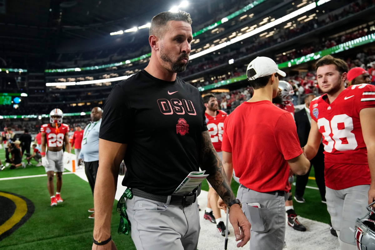 Ohio State Buckeyes offensive coordinator Brian Hartline leaves the field following the Cotton Bowl at AT&T Stadium in Arlington, Texas for the College Football Playoff quarterfinal game against the Miami Hurricanes on Dec. 31, 2025. Ohio State lost 24-14.