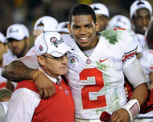 Ohio State quarterback Terrelle Pryor (R) hugs head coach Jim Tressel Rose Bowl in Pasadena, California