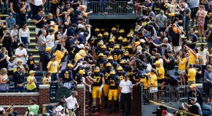 Michigan football players exiting the tunnel