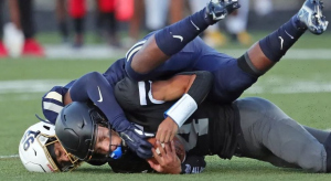 Bishop Sycamore quarterback getting tackled