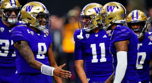 Michael Penix Jr. celebrates with teammates