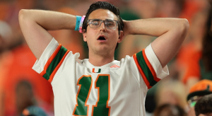 A Miami Hurricanes fan wearing a Carson Beck jersey