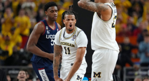 Roddy Gayle Jr. celebrating a dunk vs. UConn
