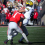 Ohio State cornerback Davison Igbinosun tackling Michigan wide receiver Tyler Morris in 2024