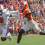 Syracuse WR Johntay Cook runs past Clemson CB Ashton Hampton