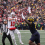 Julian Sayin throwing a pass over a Michigan defender