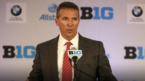 Urban Meyer holds court at 2013 Big Ten Media Days.