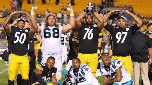 Ryan Shazier, Andrew Norwell, Mike Adams and Cam Heyward strike the O-H-I-O on Heniz Field.