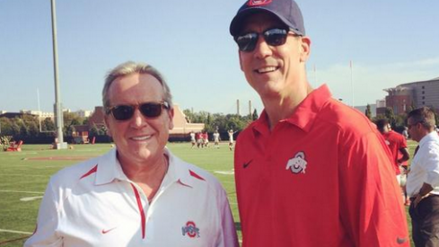 ESPN's Brad Nessler and Todd Blackledge were forced to change out of blue shirts today at practice.