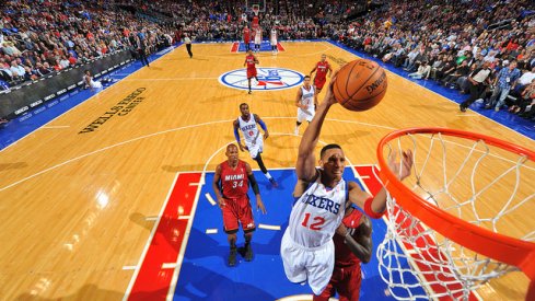 Evan Turner, then with the Philadelphia 76ers, scoring on LeBron James and the Miami Heat.