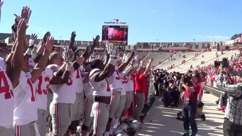 Ohio State football players and coaches sign Carmen Ohio a cappella in front of fans at Maryland.