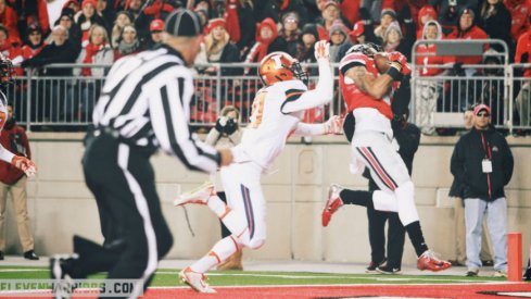 Devin Smith scores the first of his two touchdowns against Illinois.