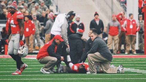 Ohio State quarterback J.T. Barrett is out for the season after breaking his ankle, a team spokesman confirmed.