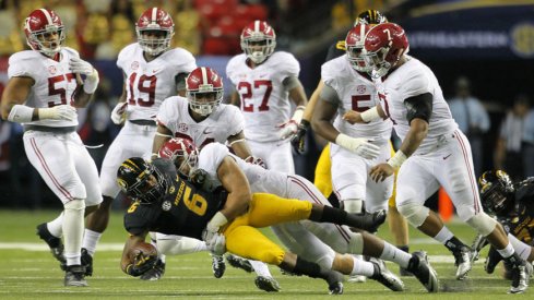 Alabama linebacker Trey DePriest with the stick