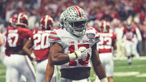 Ezekiel Elliott pounds his chest after scoring against Alabama in the Sugar Bowl.