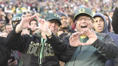 Oregon fans delighting in their Ducks' 59–20 stomping of Florida State.