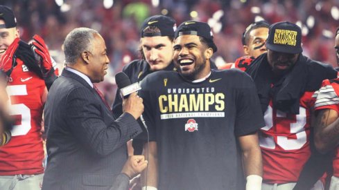 Ezekiel Elliott accepts the National Championship game MVP award Monday night.