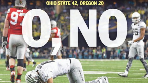 The cover of the Salem Statesman Journal with Marcus Mariota on the ground.
