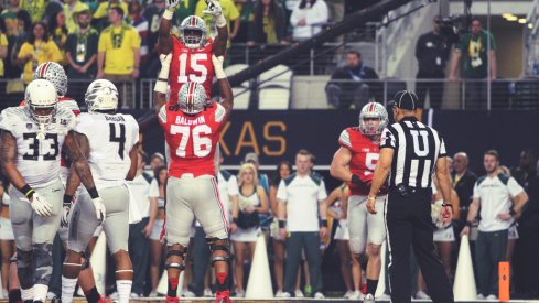 Ezekiel Elliott and Darryl Baldwin