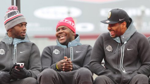 J.T. Barrett, Cardale Jones and Braxton Miller take in Ohio State's championship celebration at Ohio Stadium.