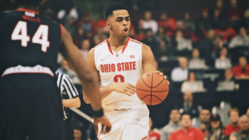 D'Angelo Russell dribbles the ball. 