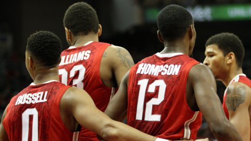 Ohio State huddles at Louisville.