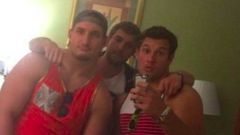 Joey Bosa, Nick Bosa, and Some Guy