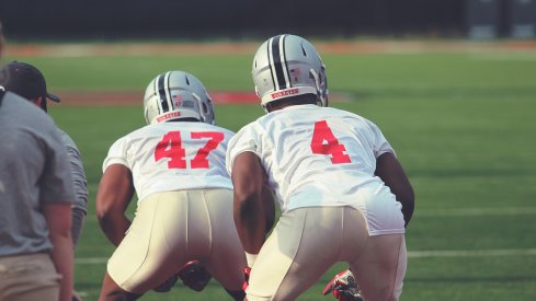 Justin Hilliard (#47) and Jerome Baker (#4) at a fall practice on August 10, 2015