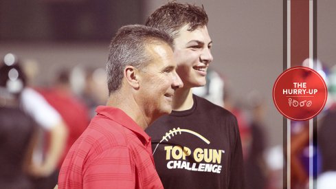 Cole Kmet and Urban Meyer at a camp in June.